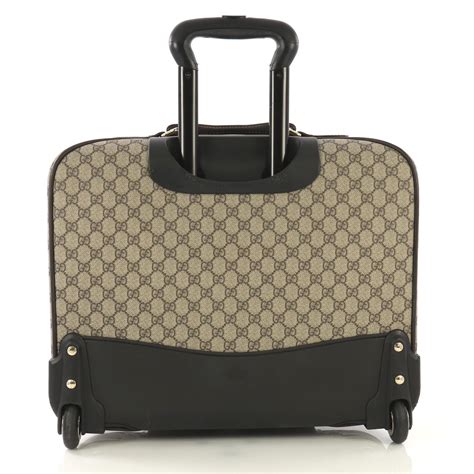 gucci wheeled luggage